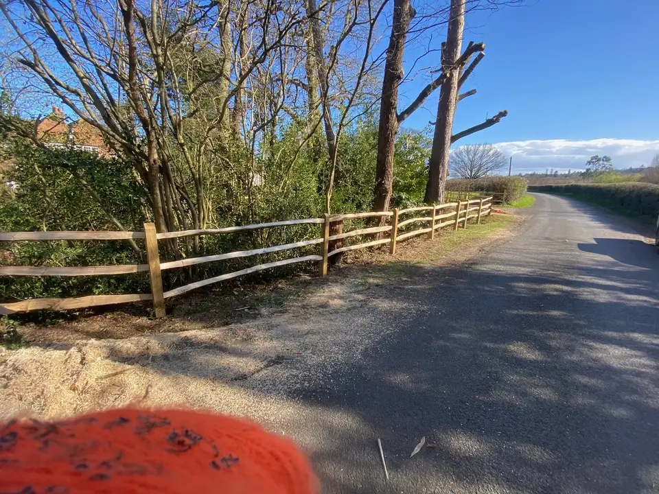 Post and rail fencing along a country lane